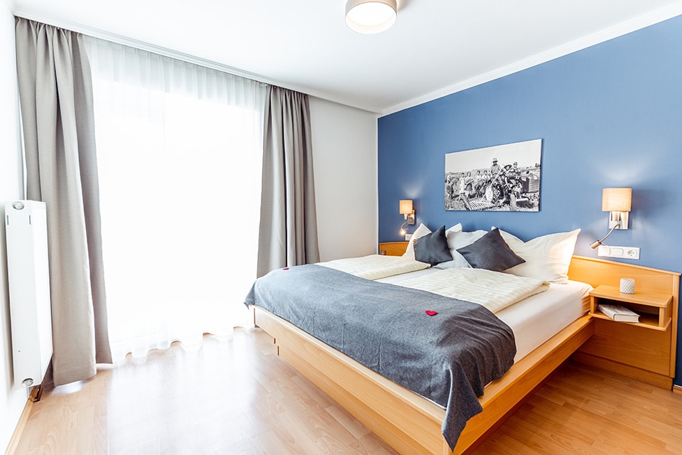 Schlafzimmer im Apartment Vellach, unserer barrierefreien Ferienwohnung im Kärnten Apartment Turnersee